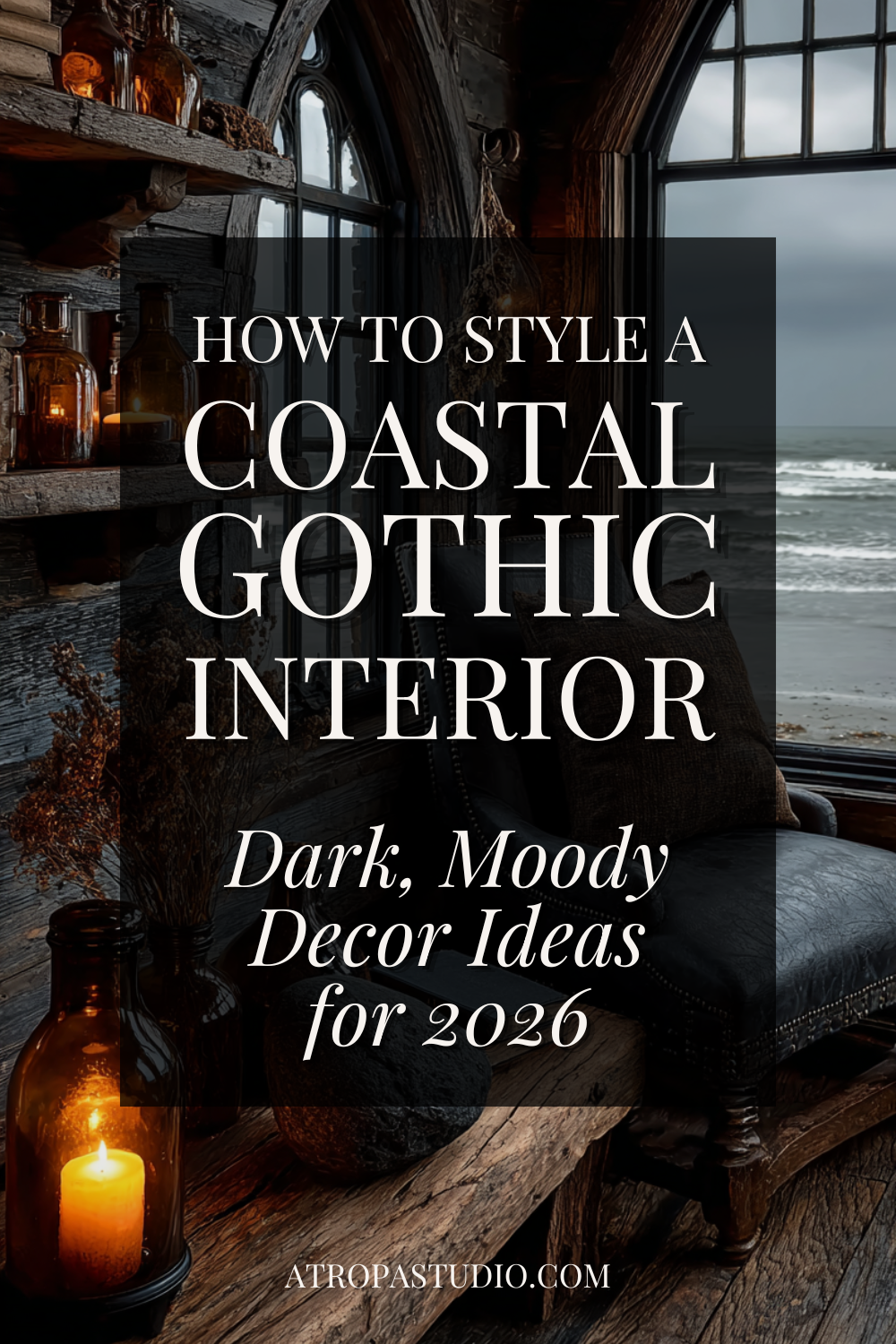 A coastal gothic interior Pinterest pin showing a dark weathered wood room with a glowing candle, amber glass bottles on a rough shelf, a worn leather chair, and a stormy grey sea visible through large arched windows