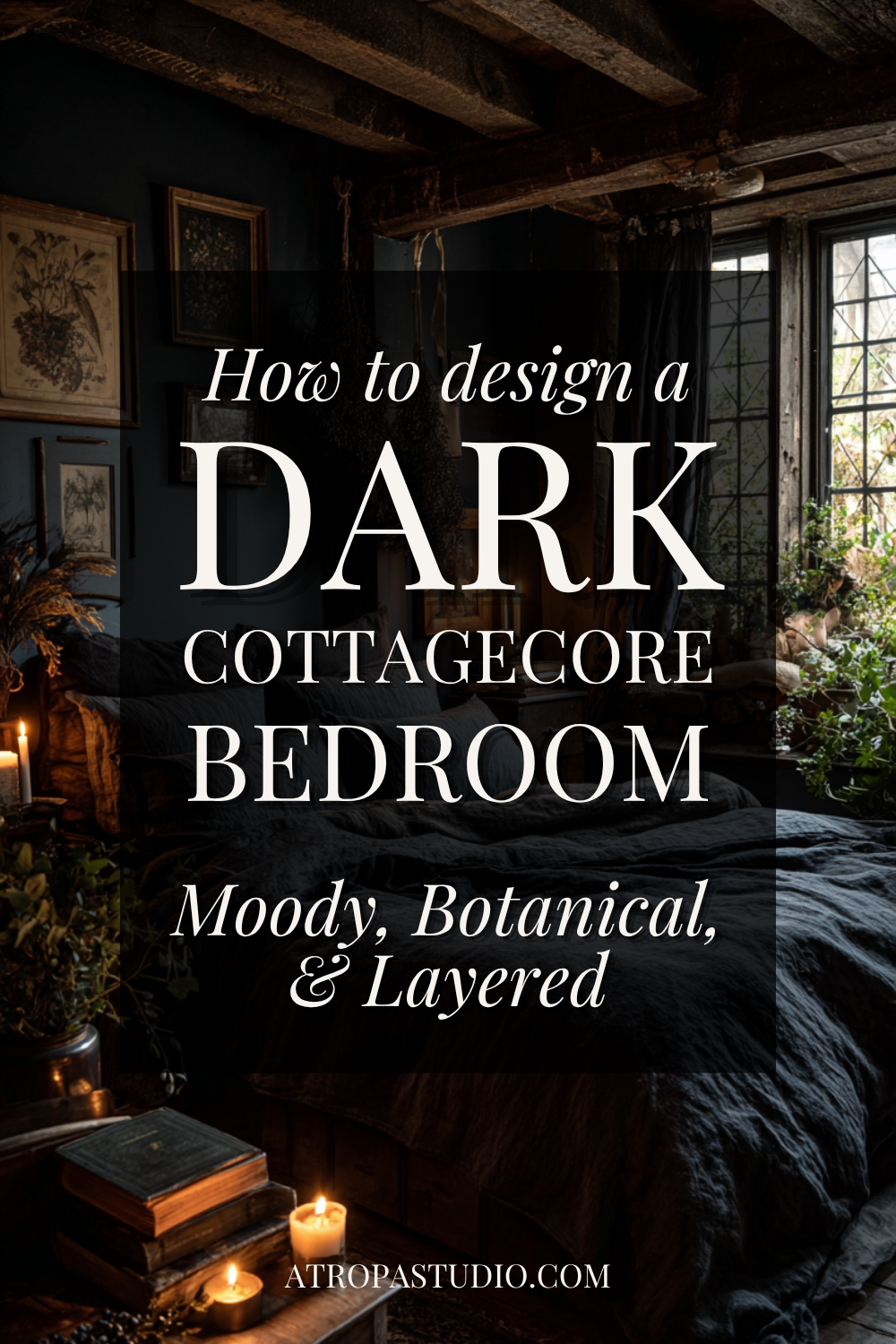 A dark cottagecore bedroom with exposed wooden ceiling beams, black linen bedding, framed botanical prints on dark walls, trailing plants by leaded windows, and candlelight